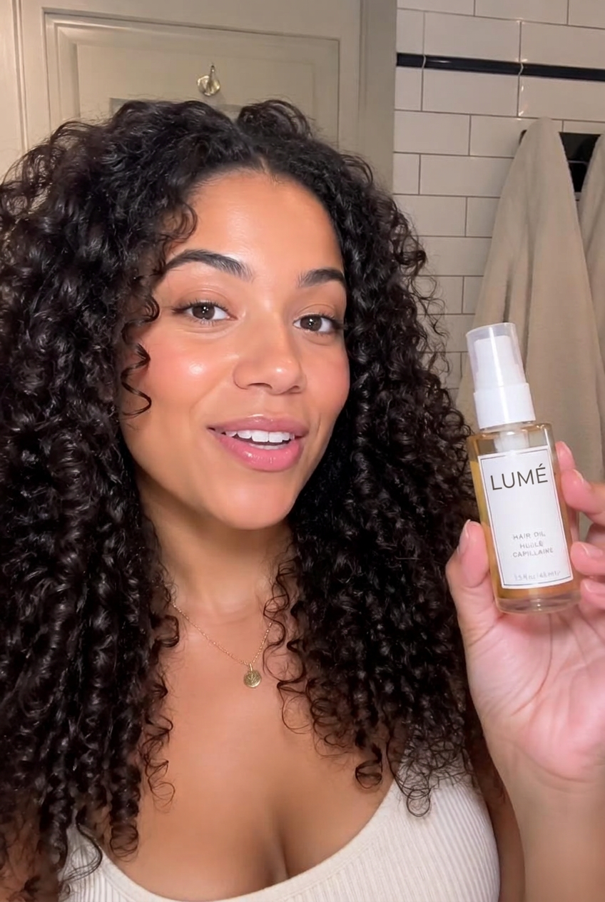 @curlswithmaya creating haircare content